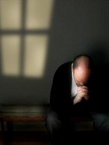 man-praying-alone